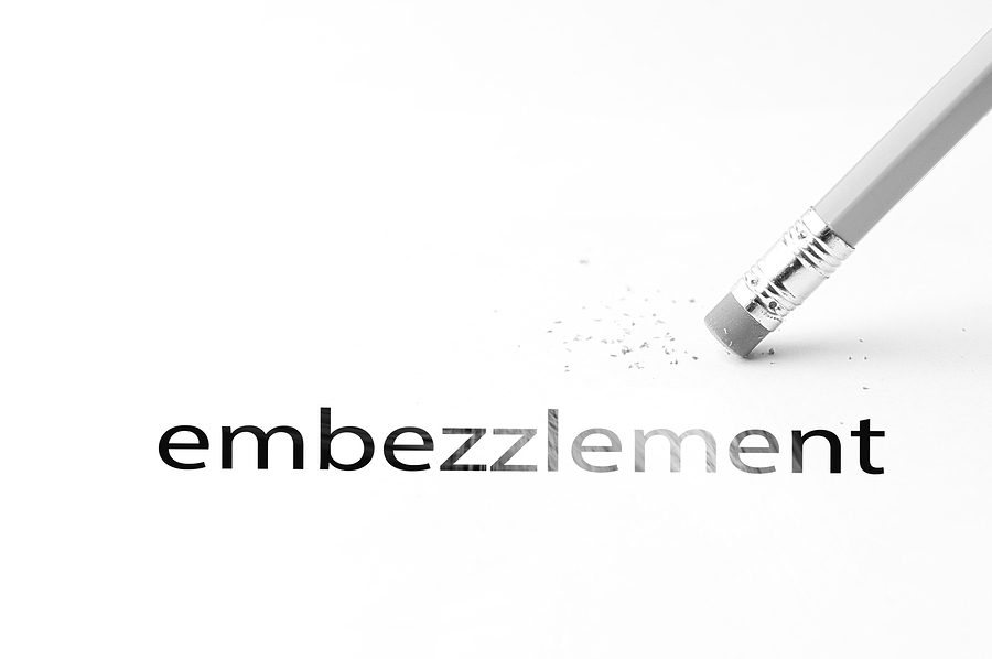 Embezzlement. Pencil with eraser.