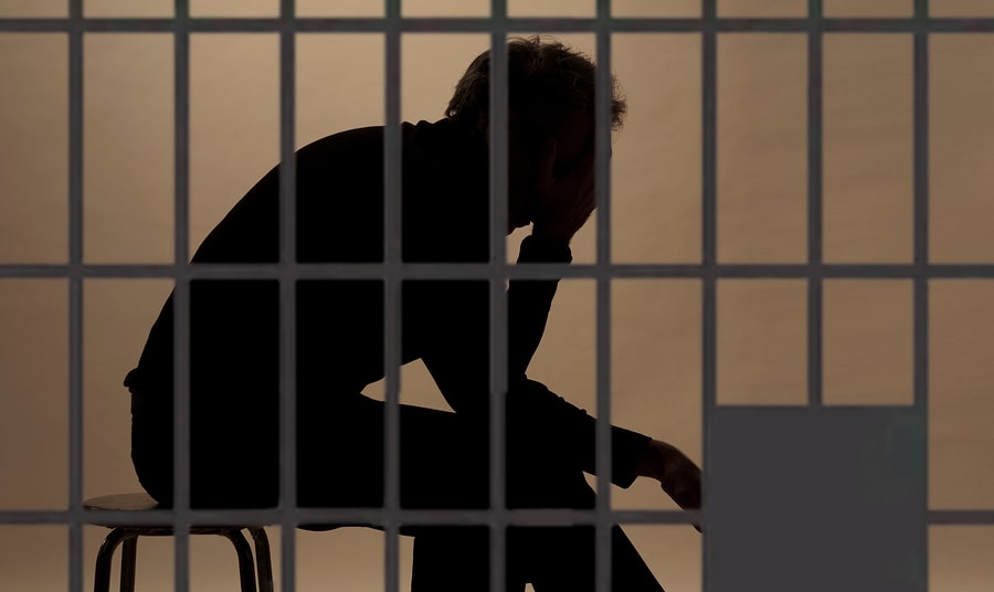 prisoner-in-prison-silhouette